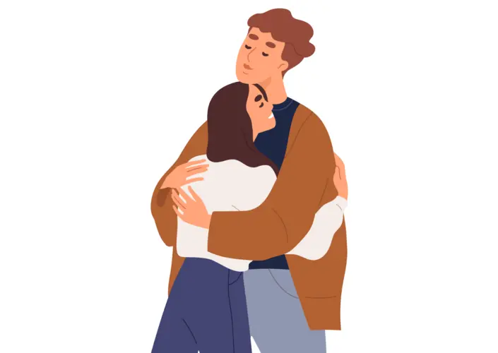 Two people hugging.